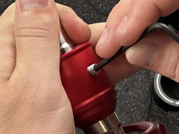 Align the holes and install the set screw provided in the hardware bag. Be sure to snug this down before moving on.