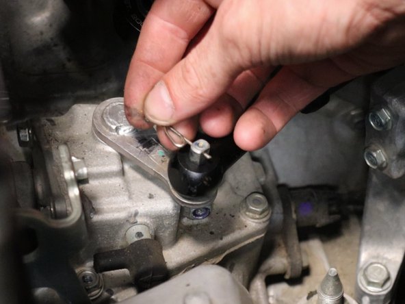 Secure the shifter cable end links with the supplier cotter pins.