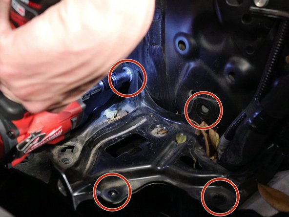 Unbolt the battery tray and remove it from the car.