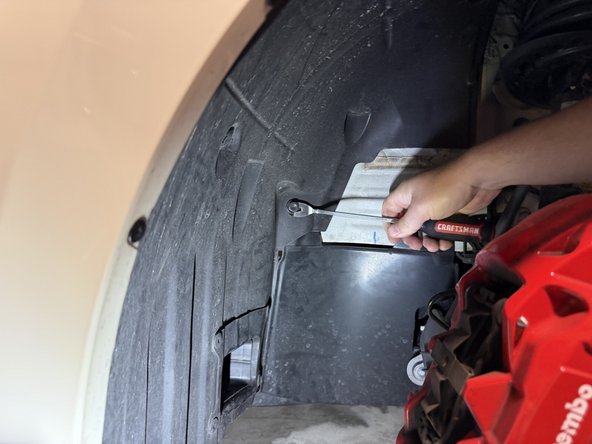 Remove these fasteners to pull the front half of the inner fender out of the wheel well.
