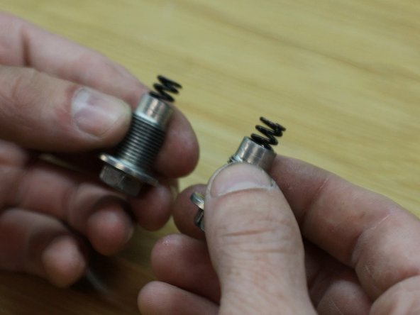 Compare the stock springs with the HR springs. Incstall them accordingly into the bolts.