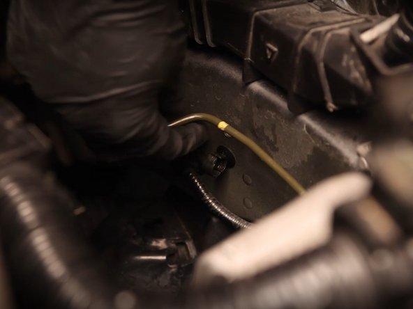 Be careful not to drip brake fluid on any painted surface.