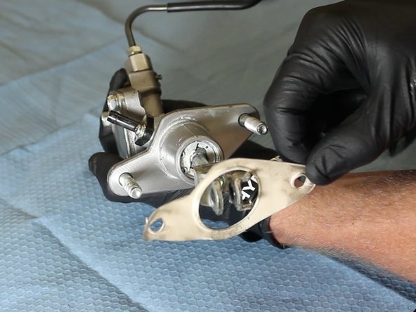 Remove the factory CMC gasket.