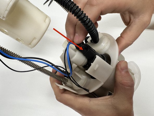 You can now plug the new pump in using the factory connector.