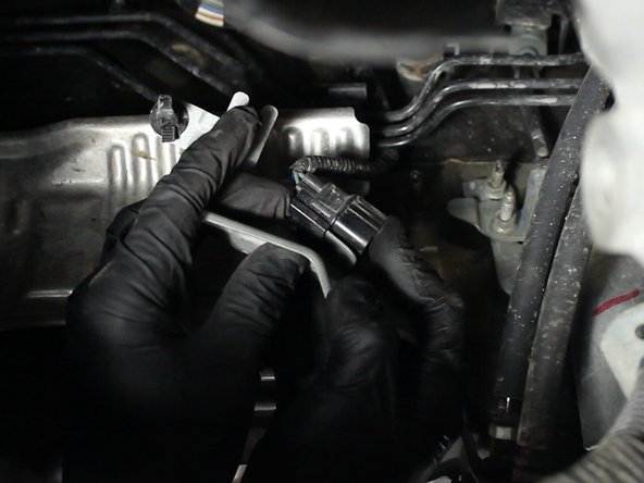 This will need to be removed to get slack out of the wire for the o2 sensor to reach from the header to the harness.