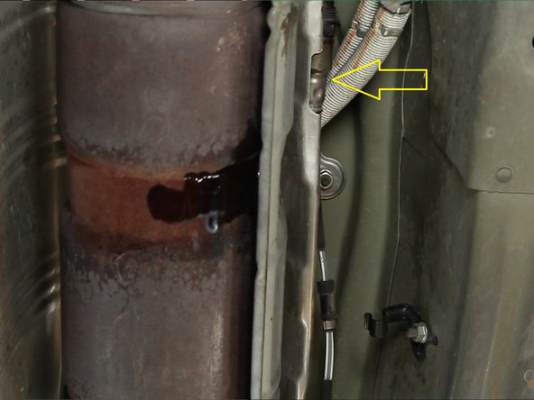 Optional: Tuck the o2 sensor up on the heat shield so that it does not get in the way of the removal of the factory exhaust manifold and catalytic converter.