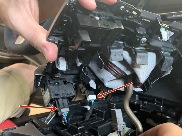 Depending on the year/model you may have more or less buttons to unplug here.