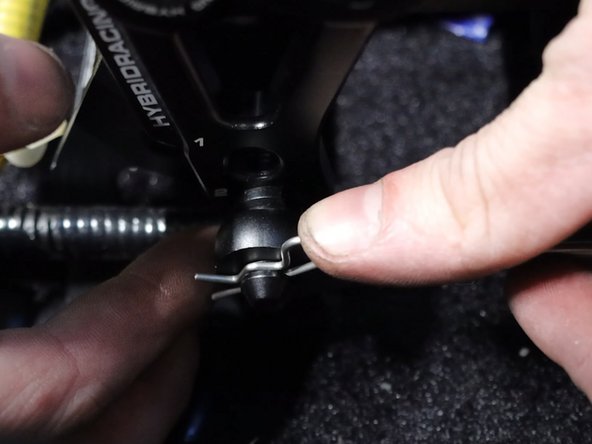 Install the cable end link to the shifter using the supplied retaining clip.