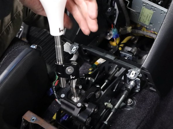 Once the clips are in place, the cables are fully installed. You may now row through each gear. Make sure everything feels good before reassembling your car.