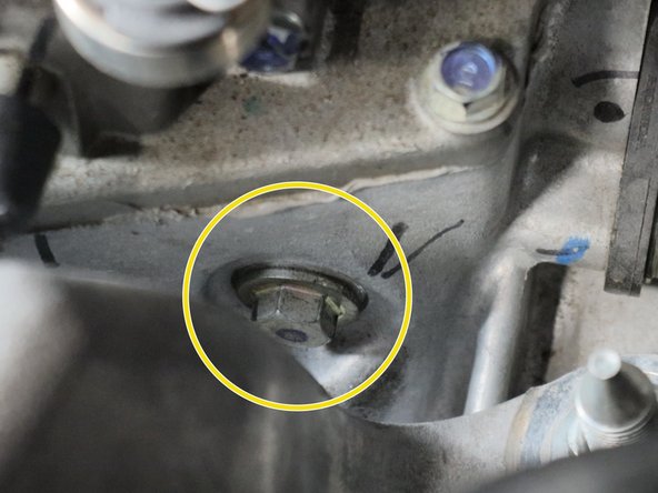 There is one on the front of the transmission gear selector and one on the side.