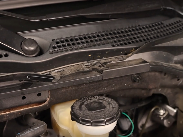 Remove the plastic reservoir access cap.