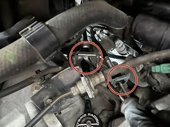 Cables removed from the vehicle in this guide are not OE. But the removal procedure is the same.