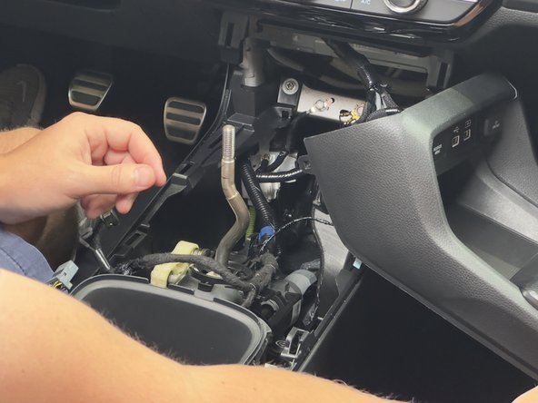 Disconnect the buttons and switches. Depending on the model, there may be 3-5 connectors. (The Si trim is shown in this guide)