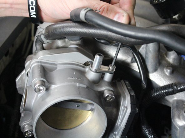 Used the supplied bolt to tighten down the bracket for the vacuum fitting.