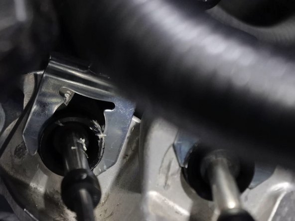 Slide the shifter cable end links back on and install using the supplied cotter pins.