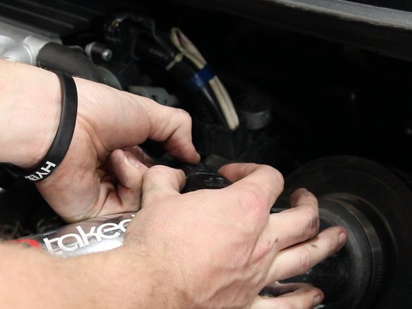 Unplug the MAF sensor and remove any bolts holding the top section of the intake in place.