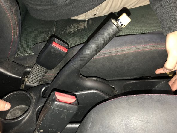 Pull the ebrake up as high as you can to make room to remove the console.