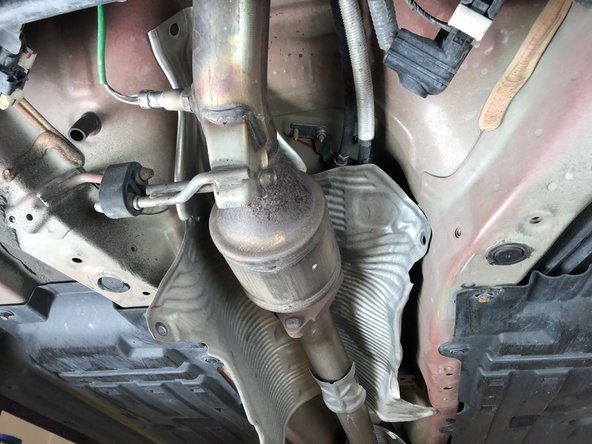 Remove the lower chassis brace.