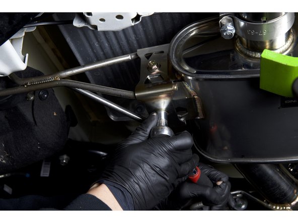 Once everything is aligned, tighten the rear muffler hangers and the remaining pipe connections.