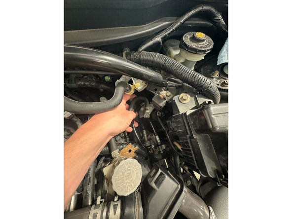 Pass the CMC and Reservoir underneath the Brake Master.