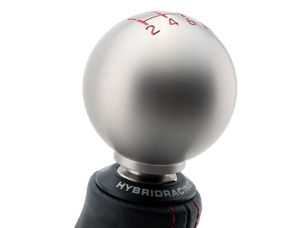 If you prefer to use the OEM Honda knobs, our boot will clip up to conceal the lower lip.  (OEM FK8 Type-R Knob Shown)