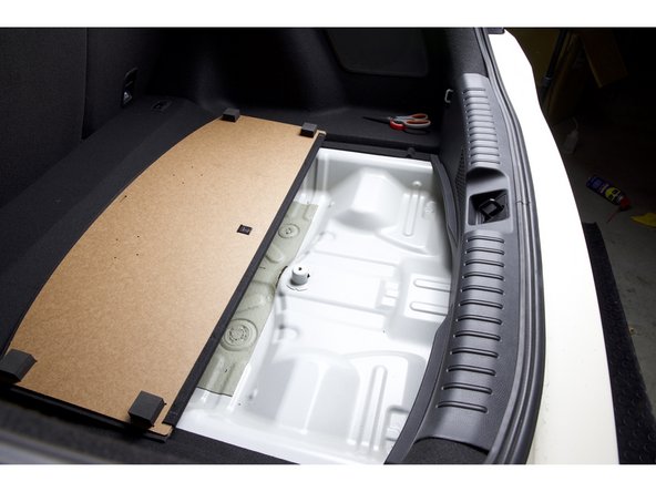 Begin installing the electronic valve controller by lifting and removing the factory FK8 rear foam tray.