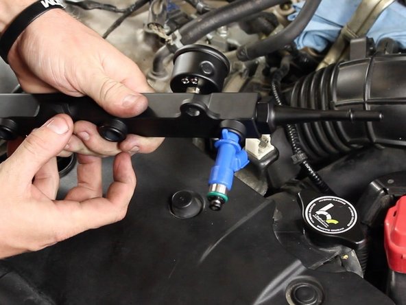 Fuel or a small amount of oil applied to the o-rings will ease the installation of the injectors into the fuel rail.