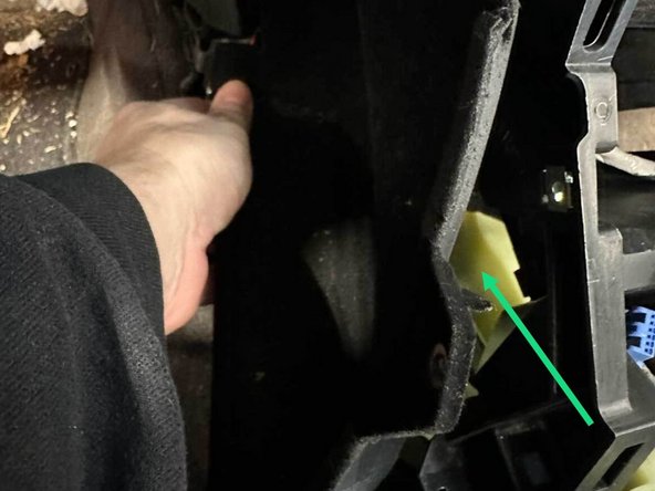 Gently pull the pocket out.