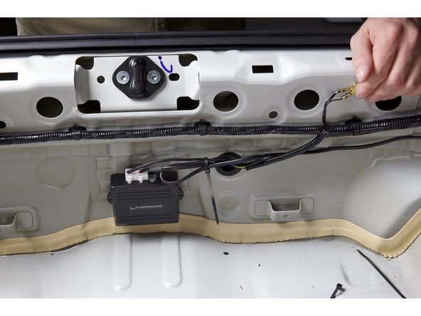 Secure the wiring harness that will travel to the front of the cabin. Use the supplied zip ties to tidy up the wiring.