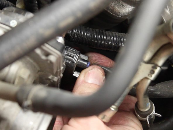 Unplug the throttle body harness plug.