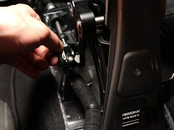 Reinstall the shifter cable clips and secure them in place with a mallet if necessary.