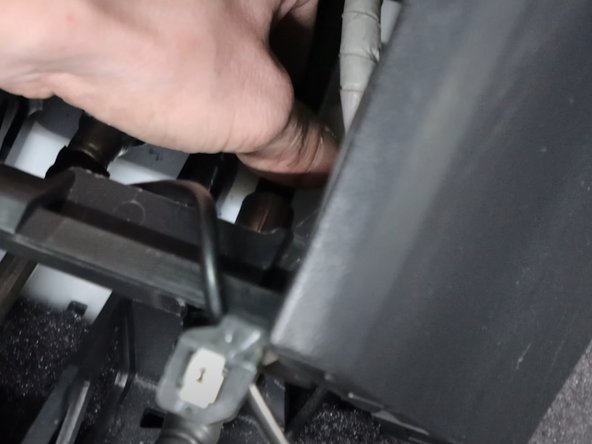 Insert the shifter cables through the end of the shifter.