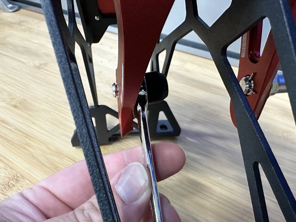 This is the throw adjustment. Adjust this pin to shorten or lengthen the front/back motion of the shifter.