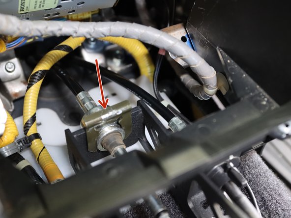 Re-install the shifter cable C clip.