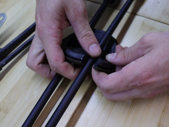 Cut two slits into the grommet and transfer it to the new cables.