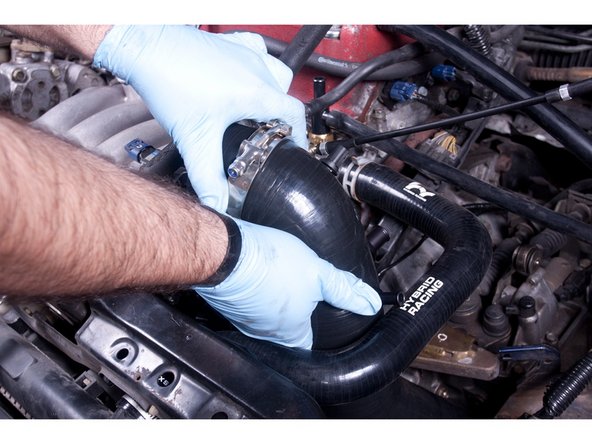 Install the intake tube for the last time.