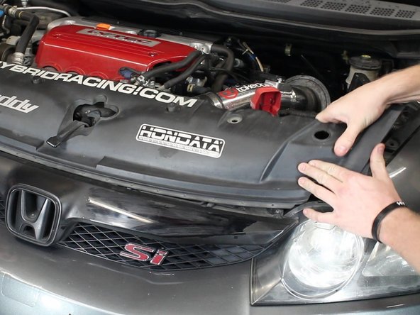 Slide the cover backwards and remove it completely.