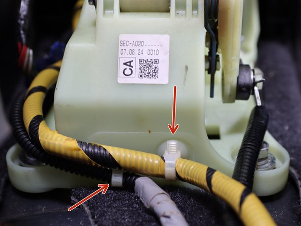 Use a plastic pry tool and remove all (x5) plastic wire harness clips from the OEM shifter.