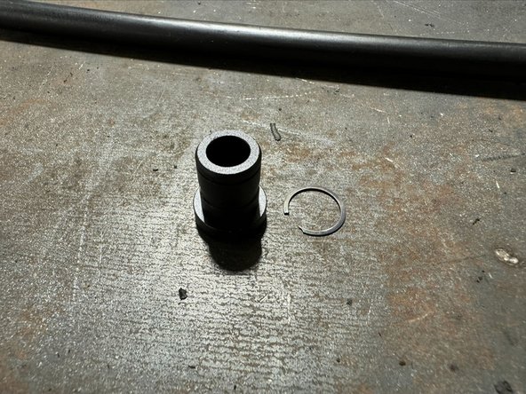 Put insert into spherical bearing on FB cable. Use supplied retaining ring to lock insert in place.