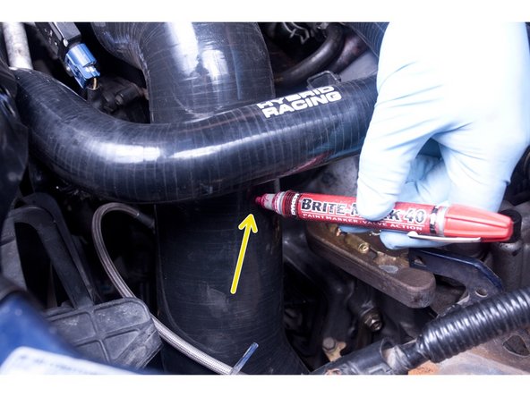 The Air Assist Valve allows for a faster warm-up in cold weather. The cylinder head cover breather tube allows for pressure relief. This may allow oil vapor to be ingested into the engine. Consider connecting an oil catch can, or simply install a breather filter if you choose.