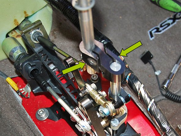 Slide the offset with the upper shifter arm attached, onto the lower shifter arm on the shifter. Adjusted where desired and tighten in place with a 5mm allen key.