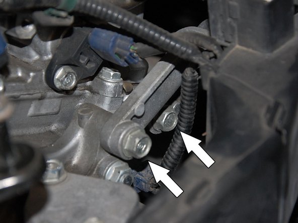 Remove the OEM air intake support bracket.