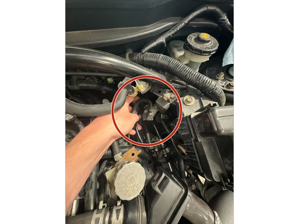 Pass the CMC and Reservoir underneath the Brake Master.