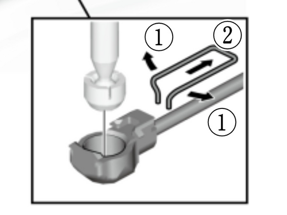 Spread the metal clip apart and pull it back on the shifter cable end. It should slide off. Then, slide the shifter cable end link away from the shifter, seperating it from the ball.