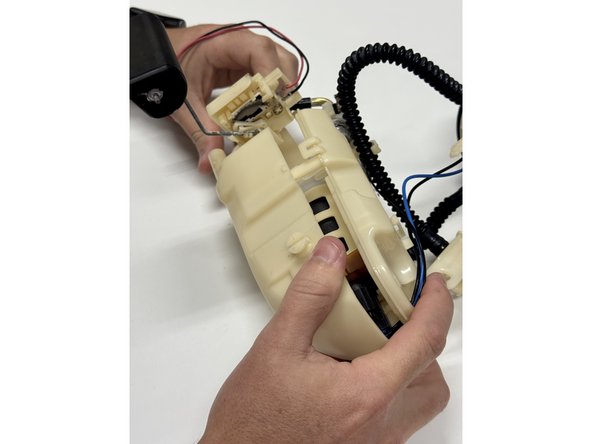 Make sure all connections and wiring parts are plugged back in. Follow the steps in reverse to make sure you've completed everything.