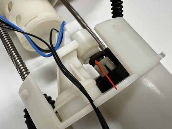 Slide the pump assembly into the housing. You may need to add a drop of lube to the o-ring so it slides into place easily. Push the pump into the housing until it stops.