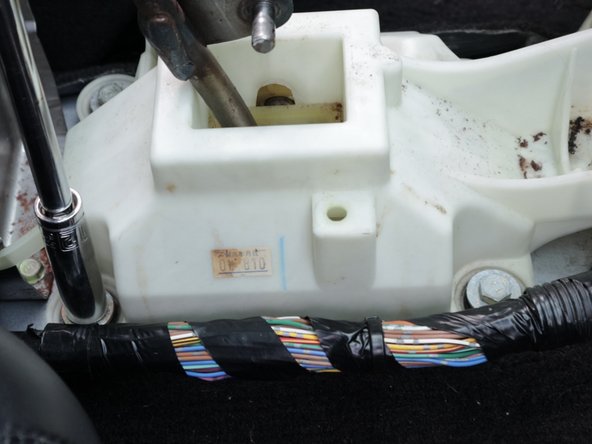 Use a 12mm socket and remove all bolts.