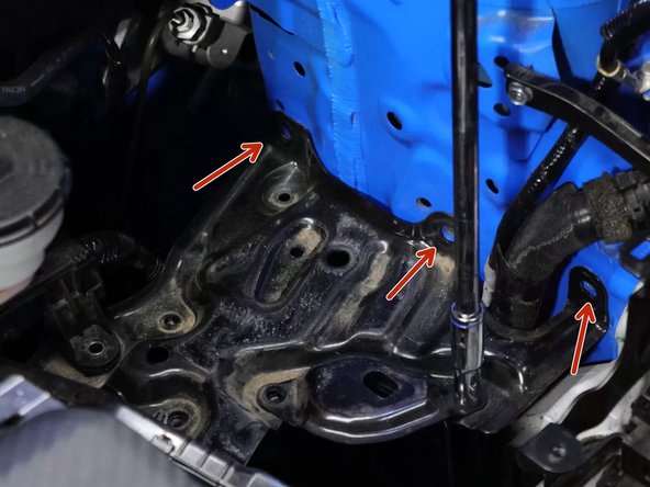 Once all of the bolts are removed, you'll need to slide the tray towards the engine and lift it out of the engine bay.