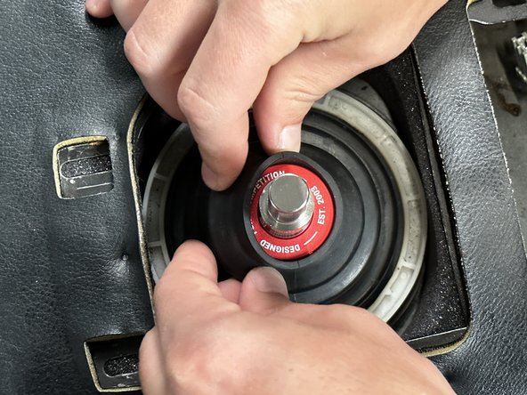 Clip it back into place. and slide the rubber over the collar.