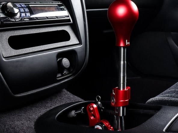 If it does, some trimming of the shift boot may be necessary. Alternatively, you can remove the shift boot if you prefer to leave the shifter assembly exposed.